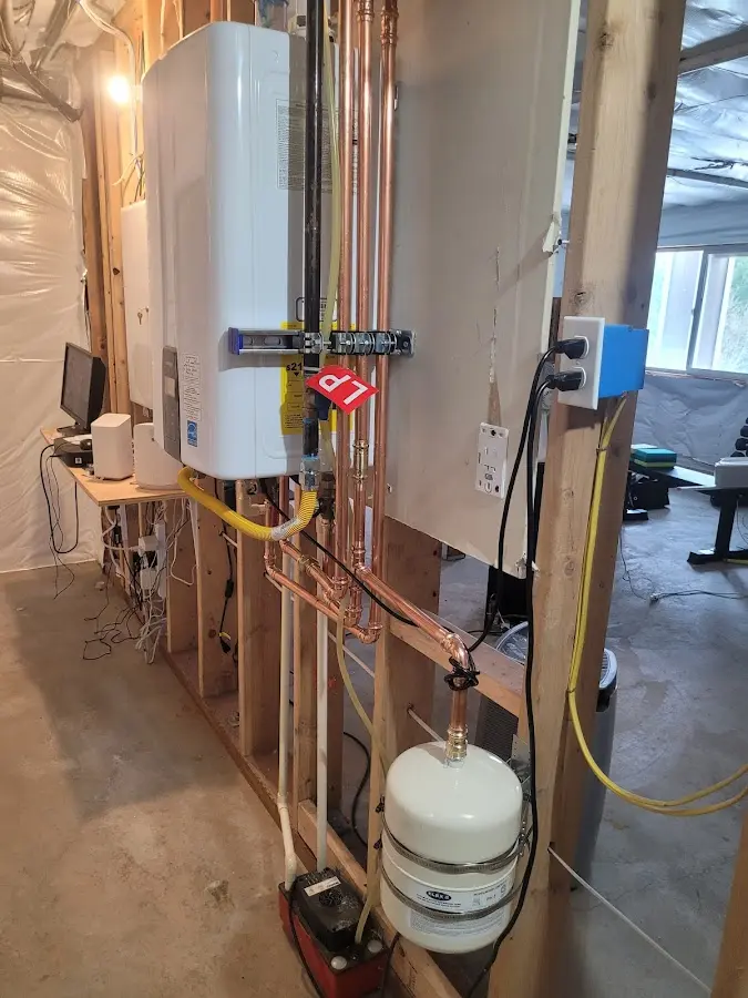 Licensed plumber repairing a kitchen sink in Mayo